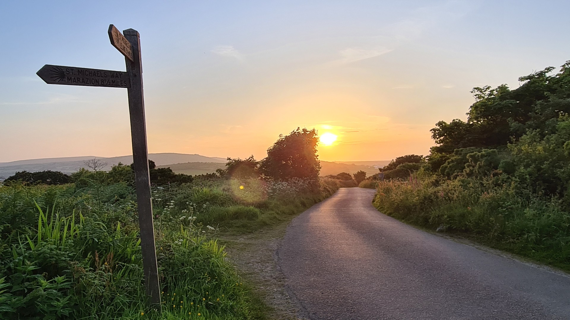 St Michael's Way signpost on a Cornish lane at sunset