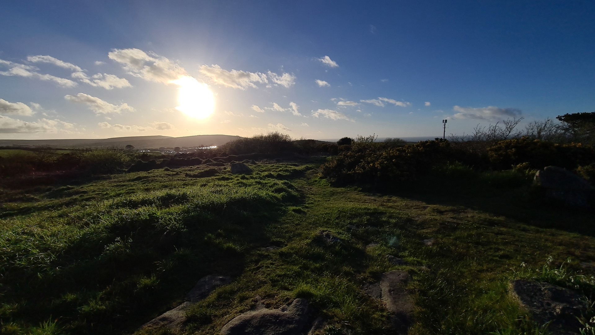 Golden hour over Cornish moorland mining landscape, West Penwith